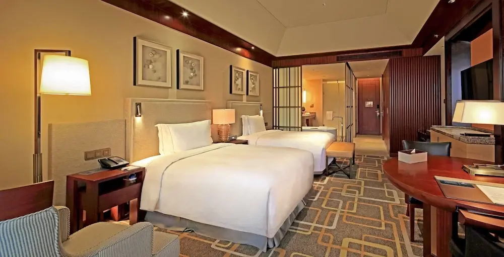 Hilton Qingdao Golden Beach - Chambres