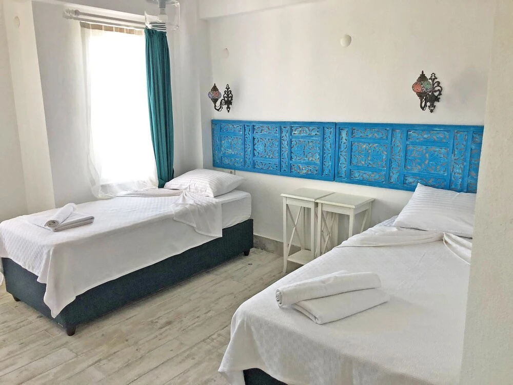 Deluxe Quadruple room with garden view