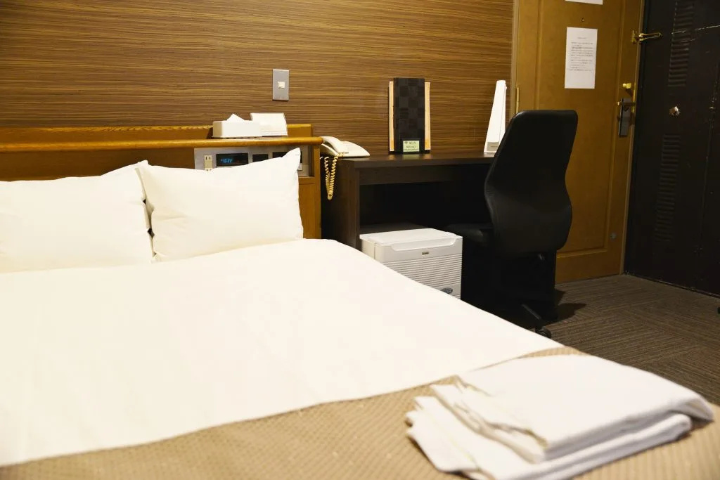 Sai Hotel - Chambres