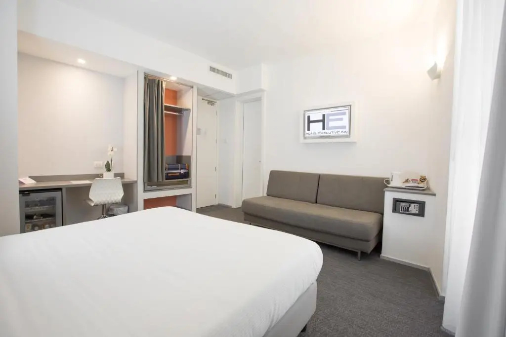 Hotel Executive Inn - Chambres