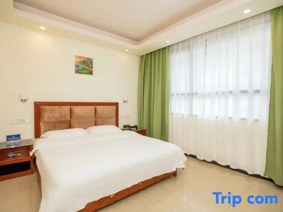 Huajun Hotel - Chambres