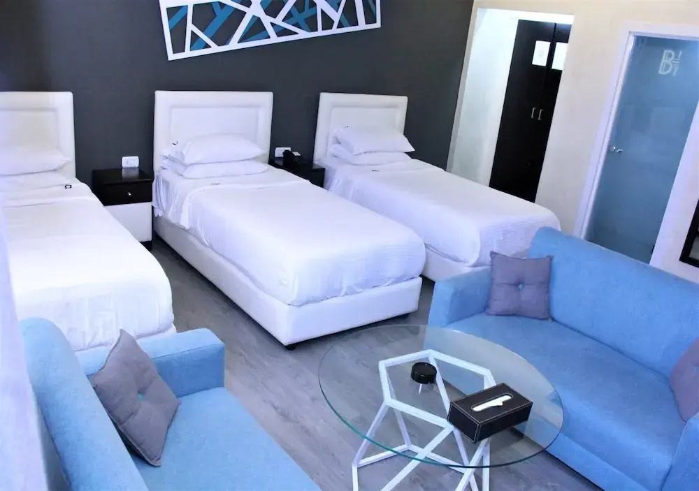 Deluxe Triple room with courtyard view