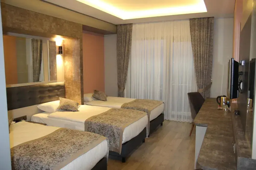 Standard Triple room with balcony
