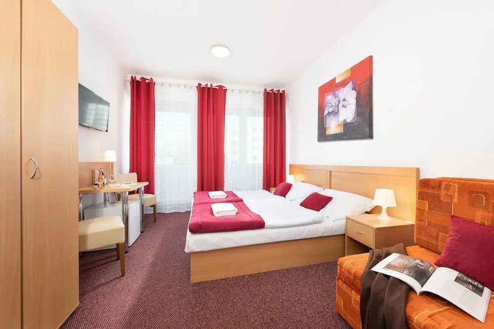 Hotel Plus - Chambres