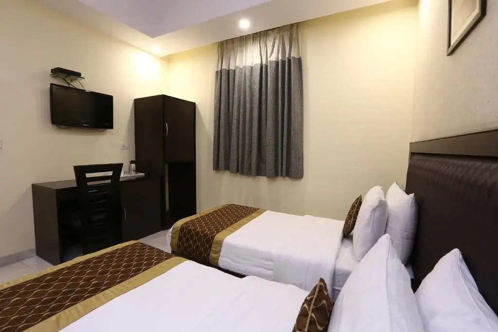 Hotel Rupam Kingston Park - Chambres