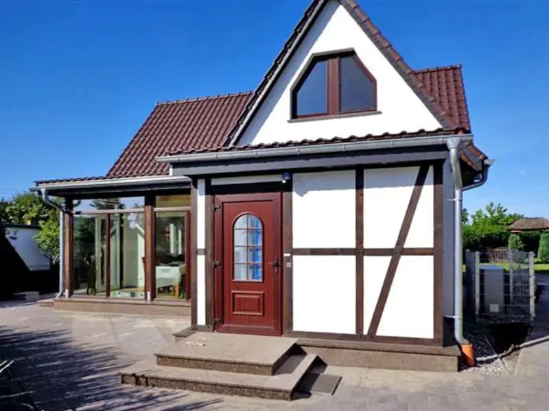 Ferienhaus mit Kamin und Wintergarten