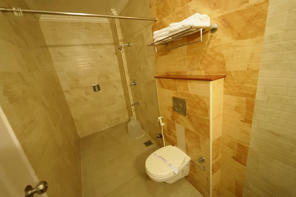 Hotel Palmyra Grand Inn - Chambres