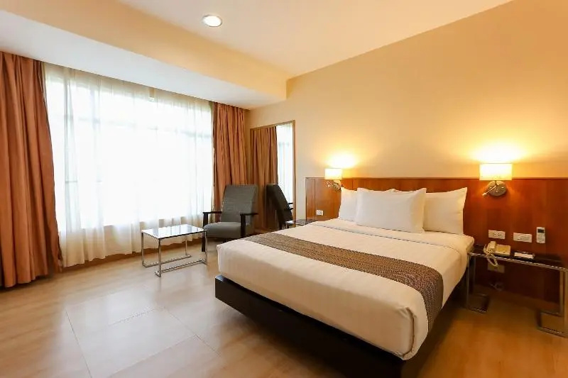 Paseo Premiere Hotel - Chambres