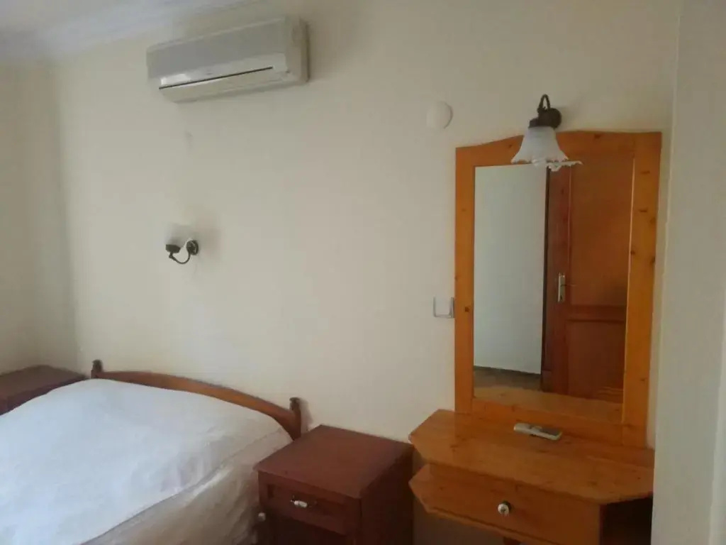 Standard Quadruple room with garden view