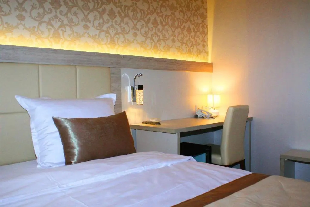 Hotel Elegance - Chambres
