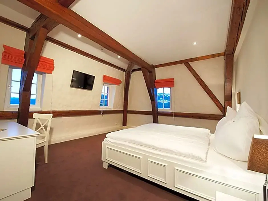 尊爵四人房，配有兩張單人床