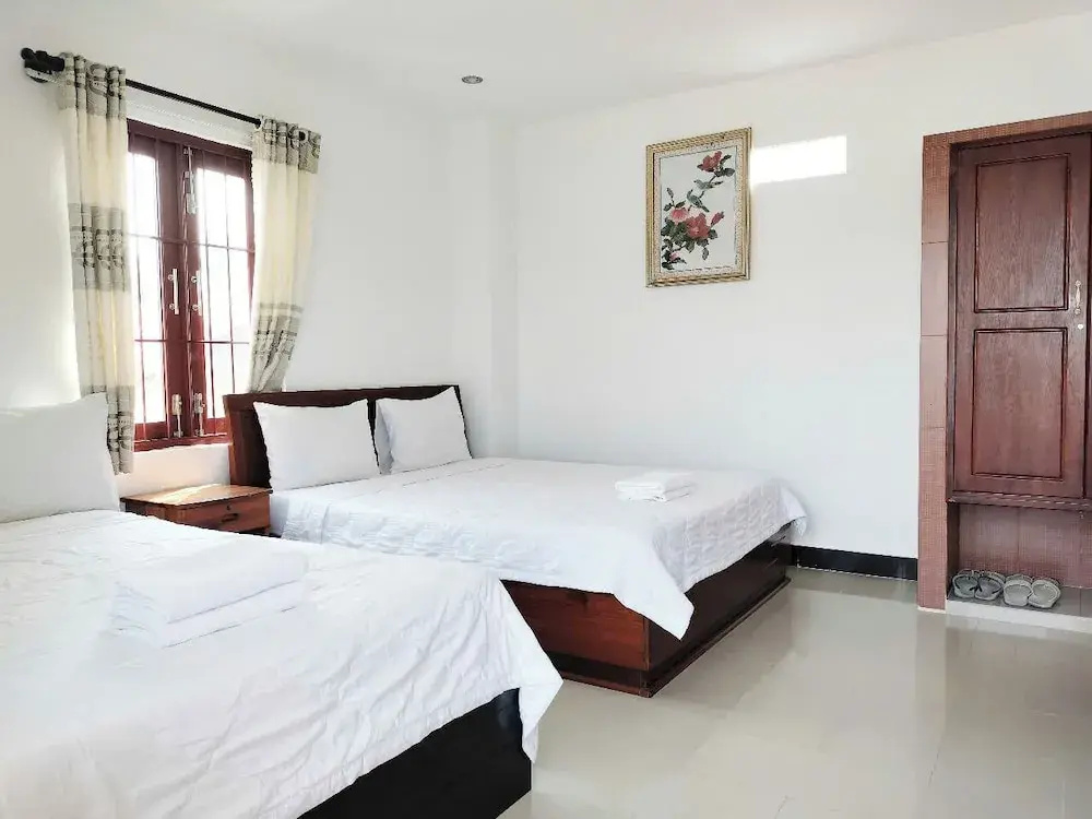 Standard Quadruple room with garden view