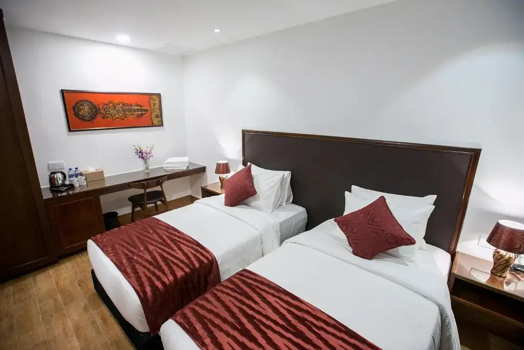 Belllo Hotel JB Central - Chambres