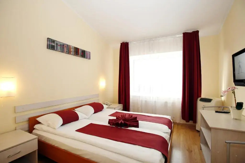 Apart Hotel TOMO - Chambres