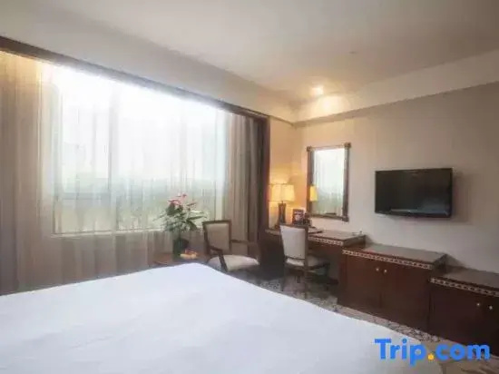 Dong Cheng Hotel - Chambres