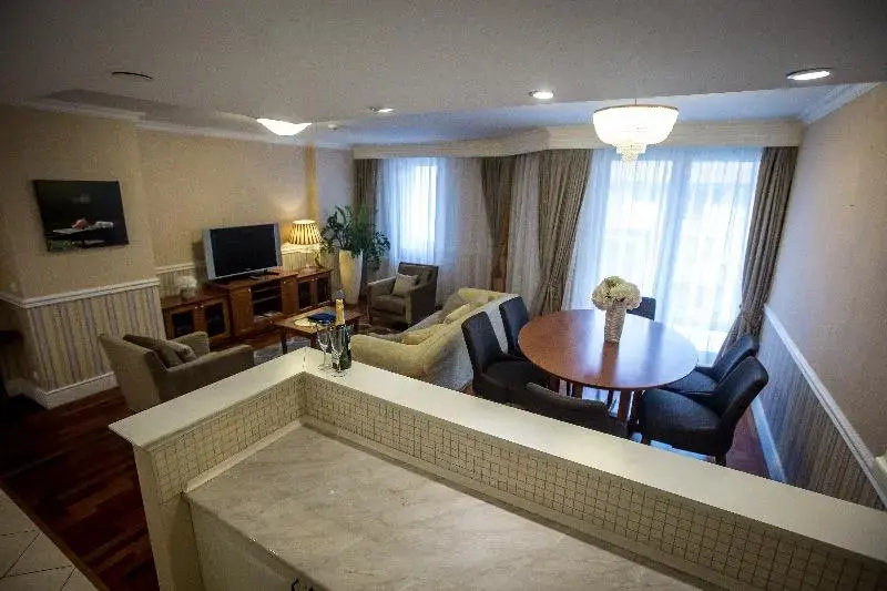 Queen's Court Hotel & Residence - Chambres