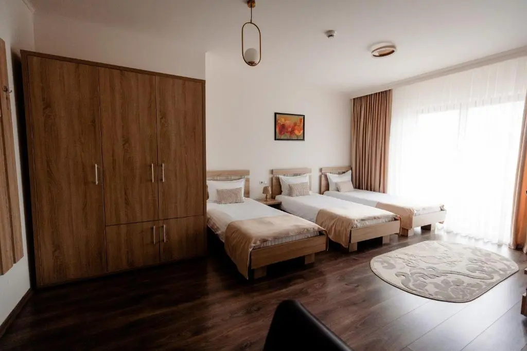 Aparthotel Punct pe i - Chambres