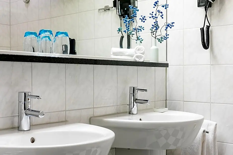 Golden Tulip Hotel Central - Chambres