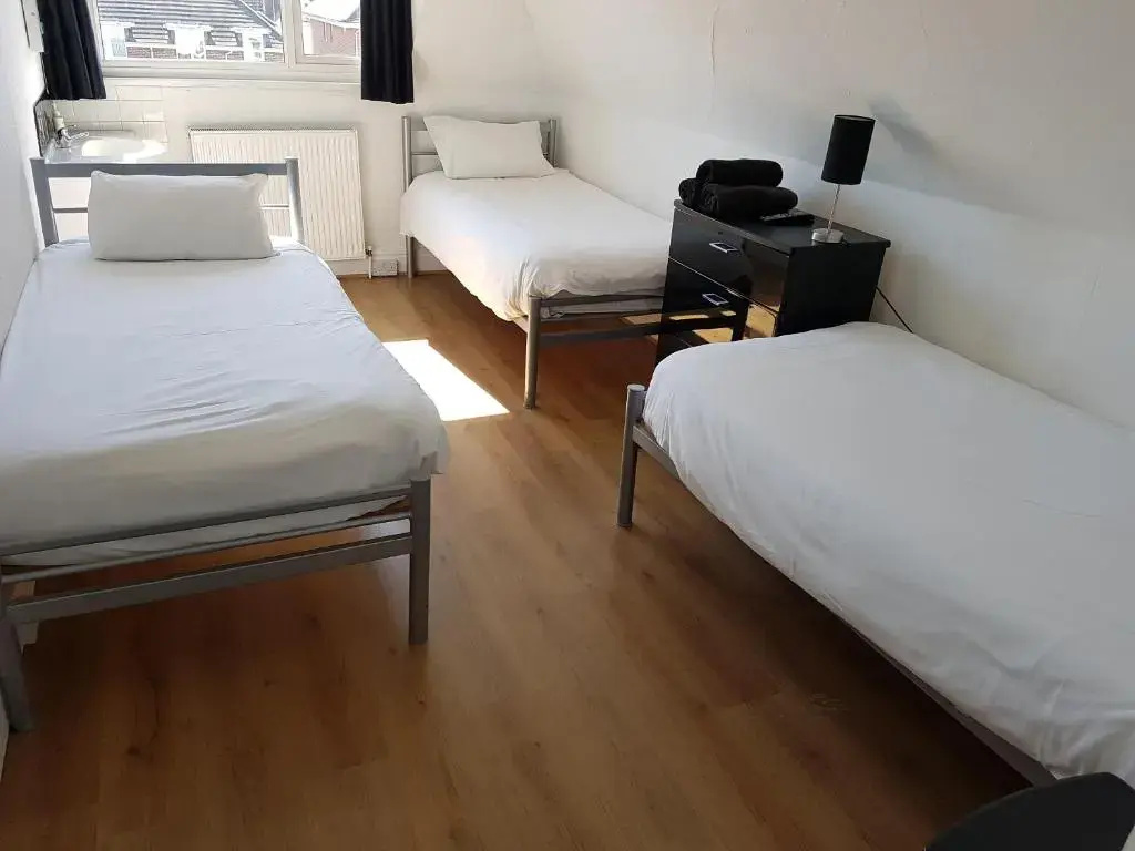 Standard Triple room with garden view