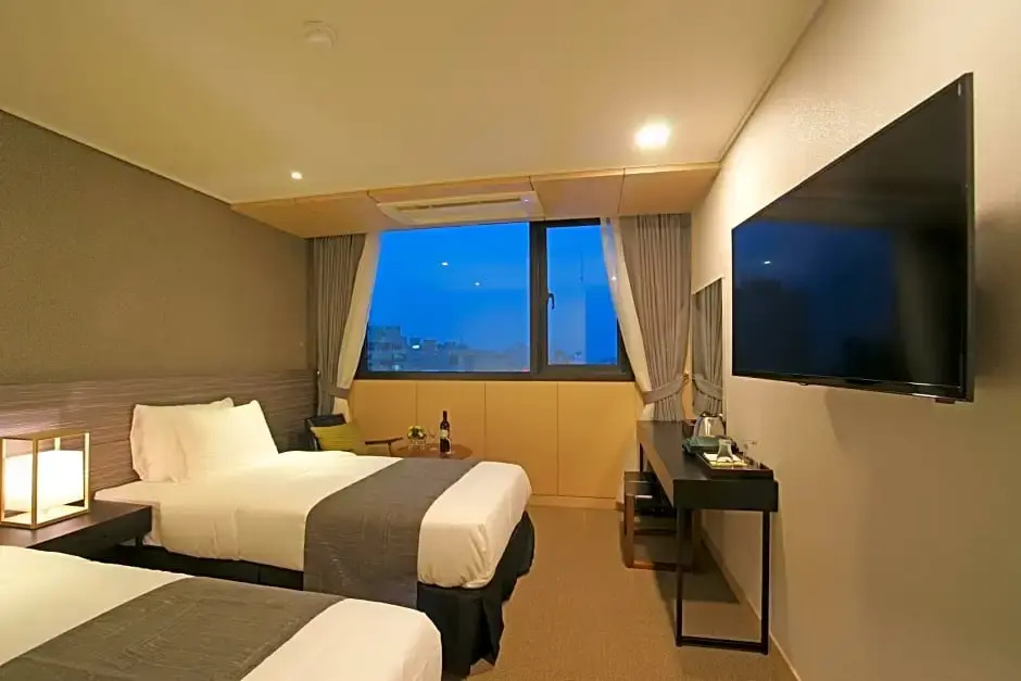 I-Jin Hotel - Chambres