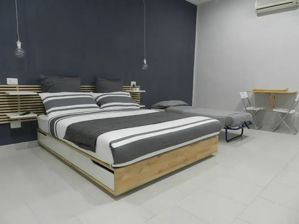 1 Bedroom Standard Quadruple Family room with city view