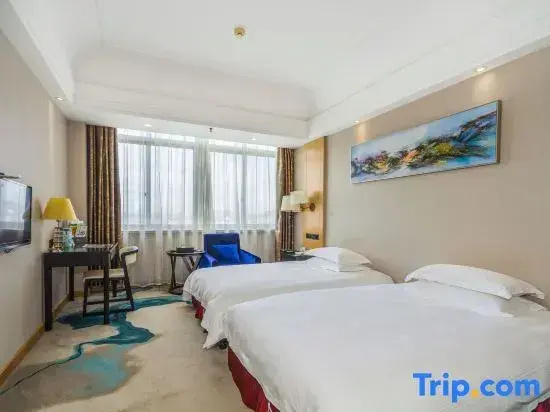 Sanyou International Hotel - Chambres