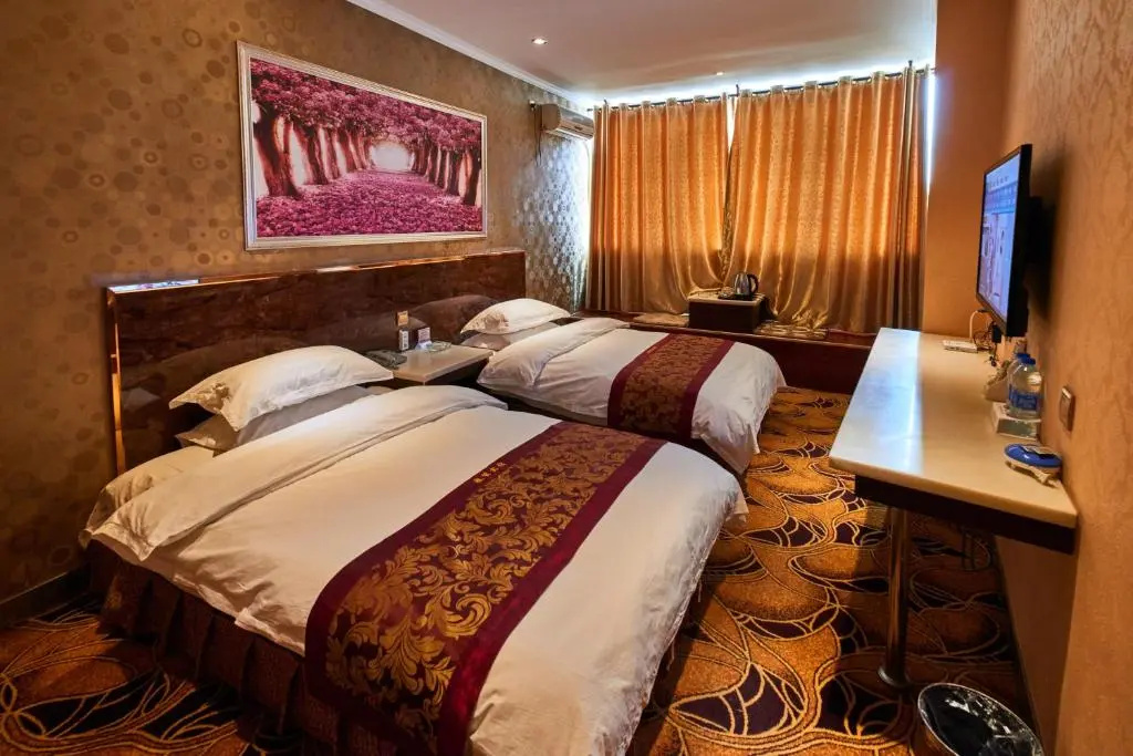 Zhangye Liangmao Hotel - Chambres