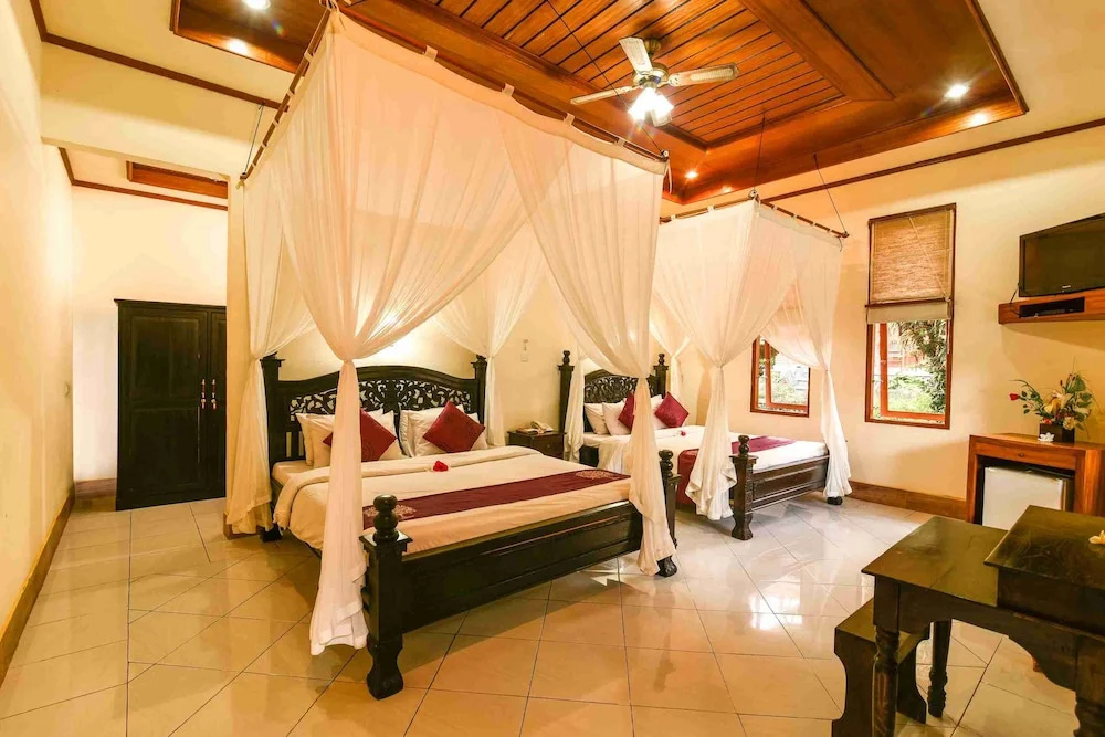 Family Suite with balcony and with garden view