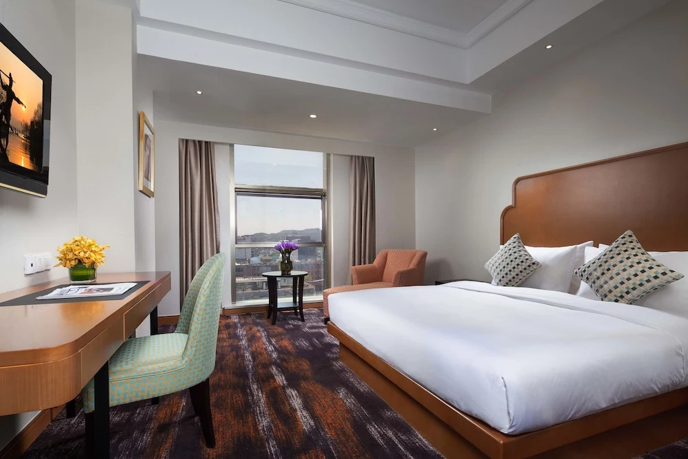 Huachen International Hotel - Chambres