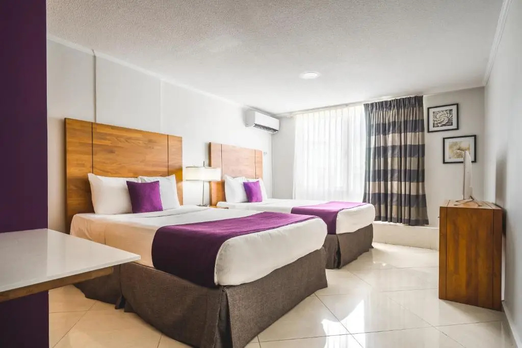 Majestic City Suites & Beach Hotel - Chambres