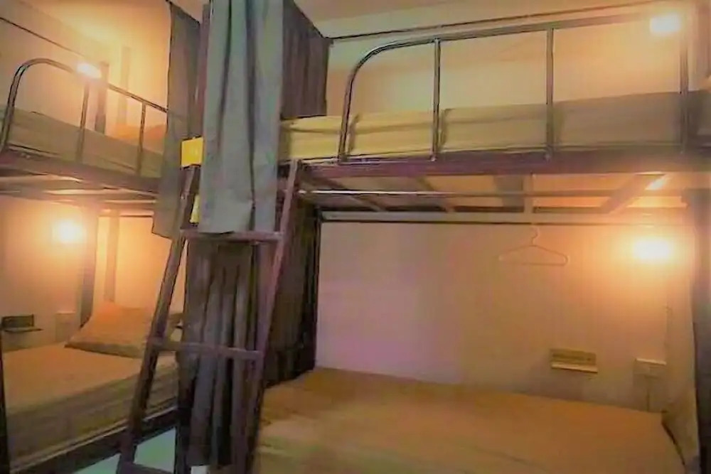 Кровать в общем номере в CM City Hostel