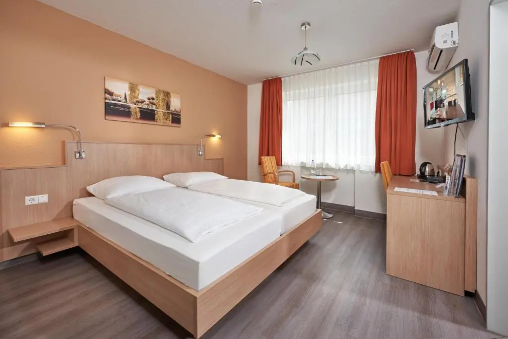 Hotel Touristik - Chambres