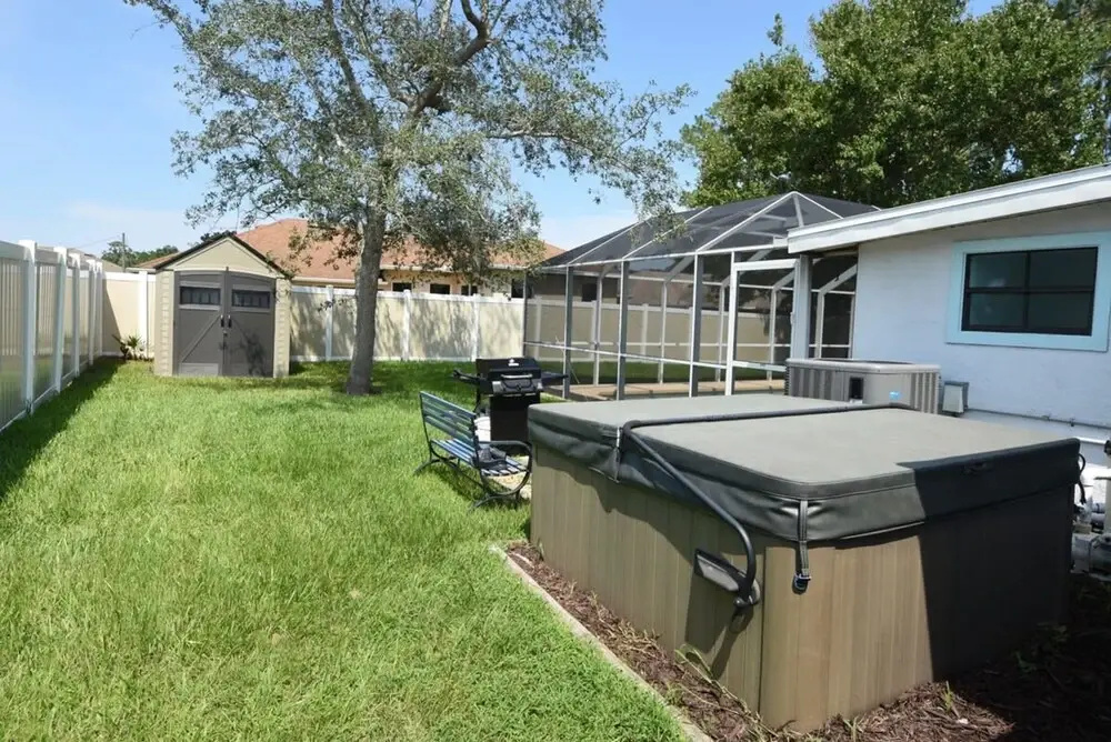 Hidden Oasis Spacious Home With Salt Water Heated Pool Hot Tub Fenced Yard Pets are Welcome