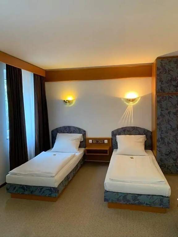 Hotel Mondial Comfort - Chambres