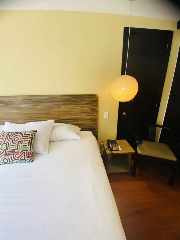 Hotel Retiro 84 - Chambres