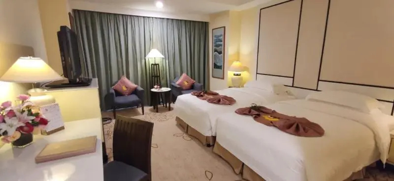 Hainan Junhua Haiyi Hotel - Chambres