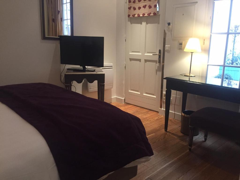Двухместный номер Standard двуспальная кровать в Hôtel Suites Unic Renoir Saint Germain