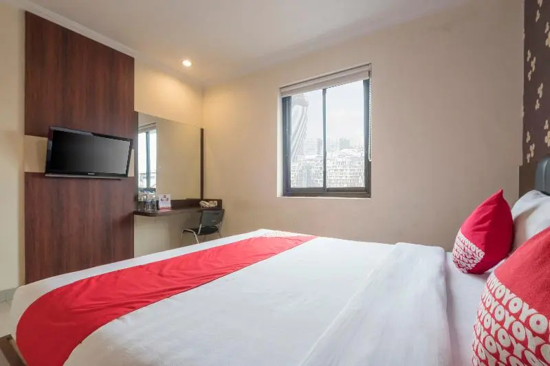 RedDoorz Plus @ Grand Pacifik Hotel Makassar - Chambres