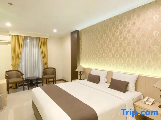 The Amrani Syariah Hotel - Chambres