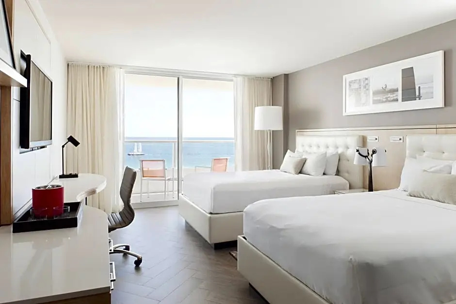 Guest room with balcony and oceanfront