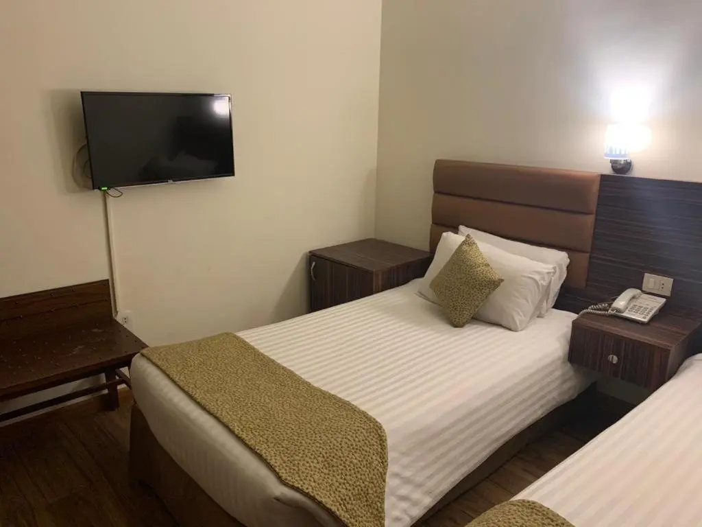 Golden Carven Hotel - Chambres