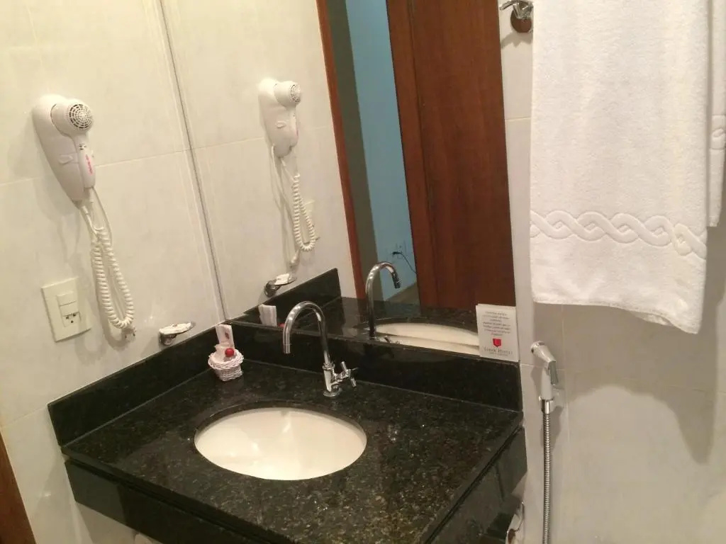 Liber Hotel Nova Serrana - Chambres
