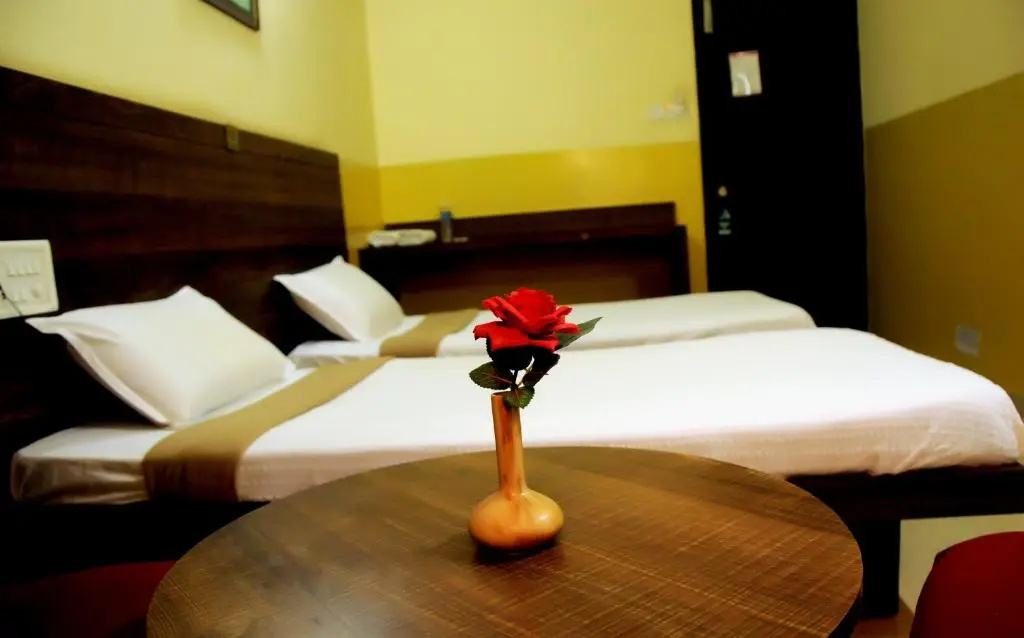 Suvarna Residency - Chambres