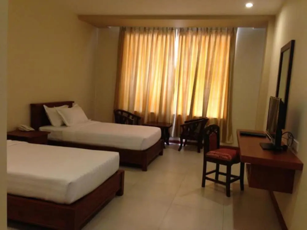 Man Myanmar Hotel - Chambres