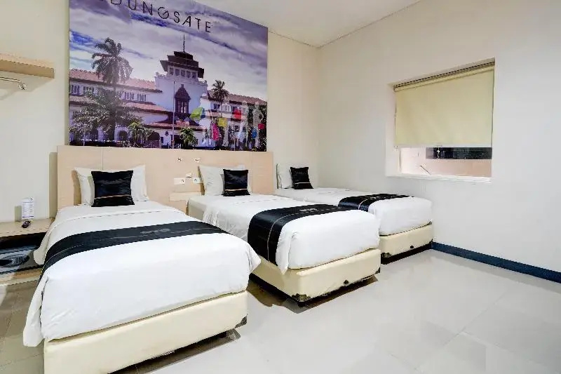 Townhouse Oak Cihampelas Near Ciwalk Formerly Promenade Hotel - Chambres