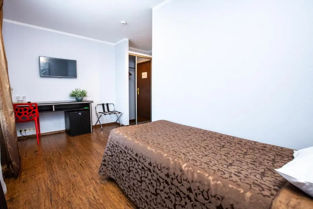 Primo Hotel - Chambres