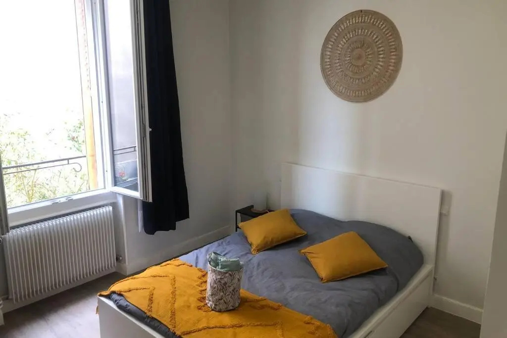 Voir la photo 1 — Grand appartement moderne tout équipé avec jardin