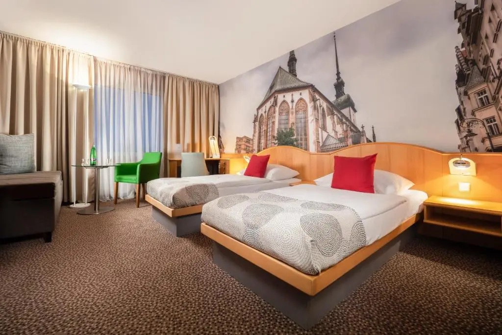 Cosmopolitan Bobycentrum - Chambres