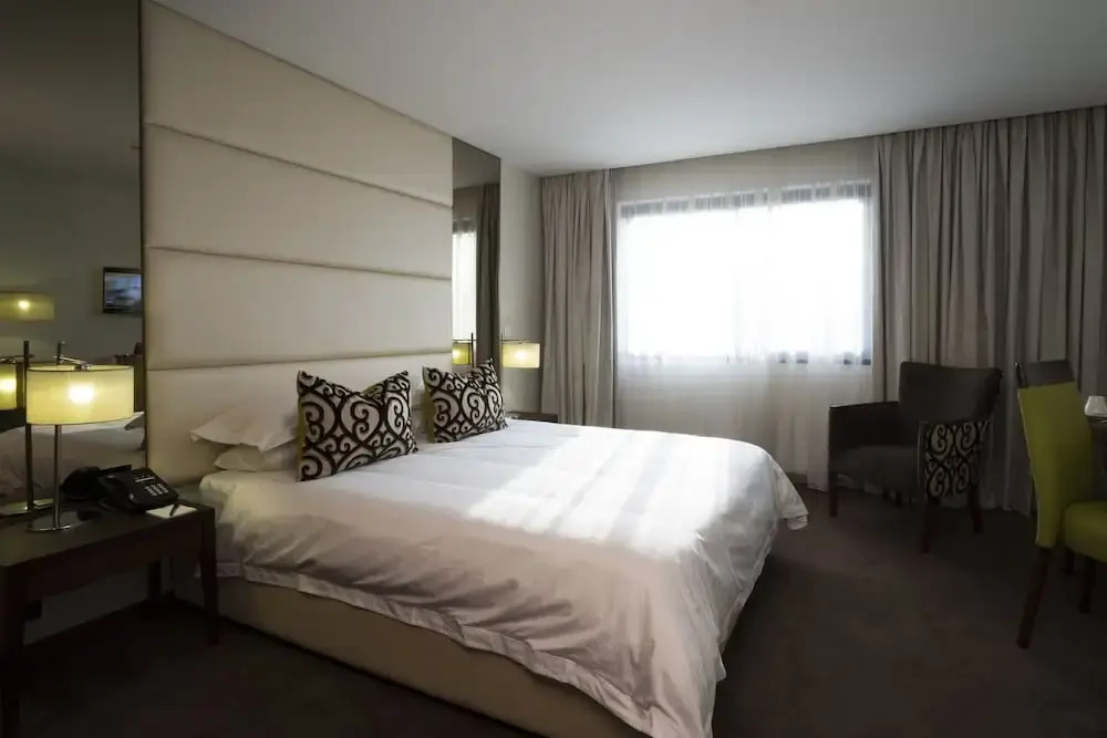 Fiesta Residences Boutique Hotel and Serviced Apartments - Chambres