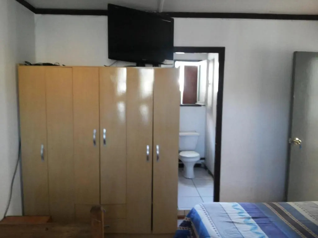 Residencial Las Palmeras - Chambres